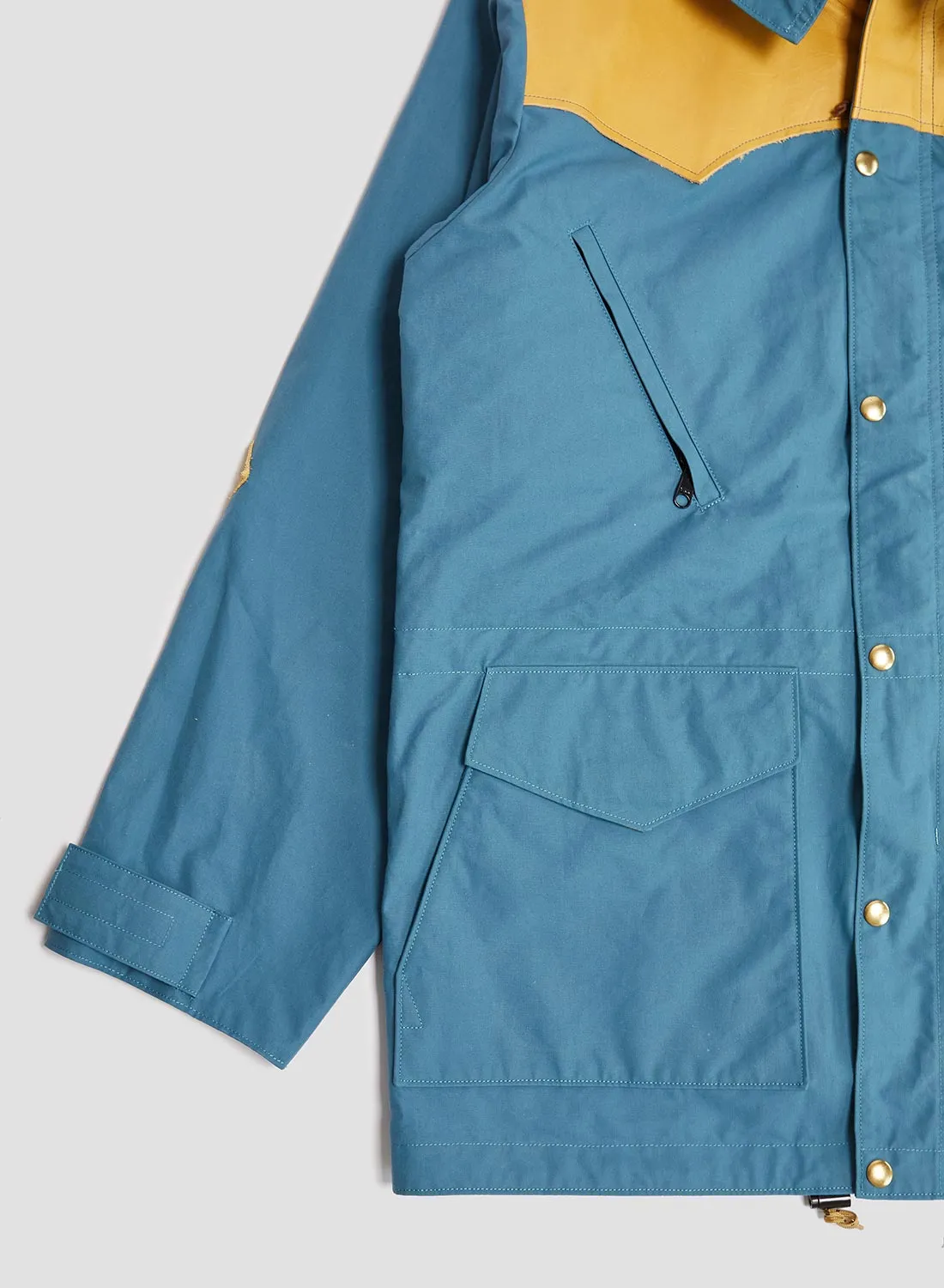 Rocky Mountain Featherbed x Nigel Cabourn Mountain Parka Dry Wax in Blue