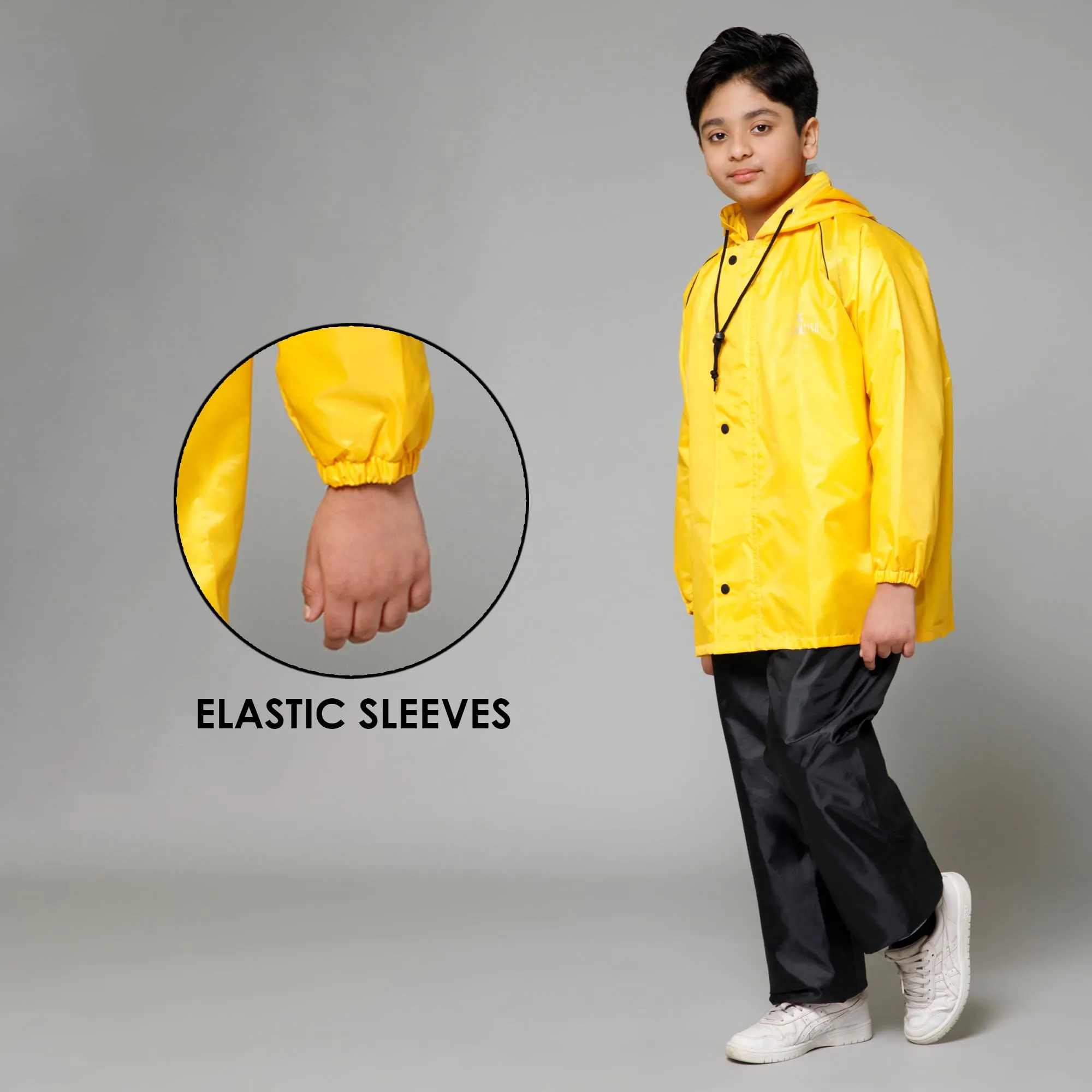 THE CLOWNFISH Duke Series Kids Waterproof Polyester Double Coating Reversible Raincoat with Hood and Reflector Logo at Back. Set of Top and Bottom. Printed Plastic Pouch. Kid Age-8-10 years (Yellow)